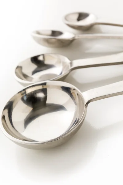 Measuring spoons on table — Stock Photo, Image