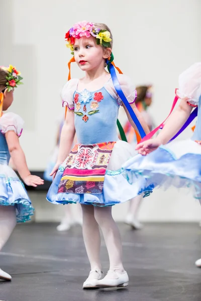 Little girl dancing in Russian costume — Stock Photo, Image