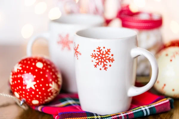 Hot chocolate with red snow flakes — Stock Photo, Image