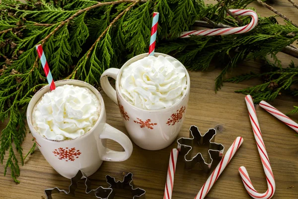 Hot chocolate with whipped cream and straw — Stock Photo, Image