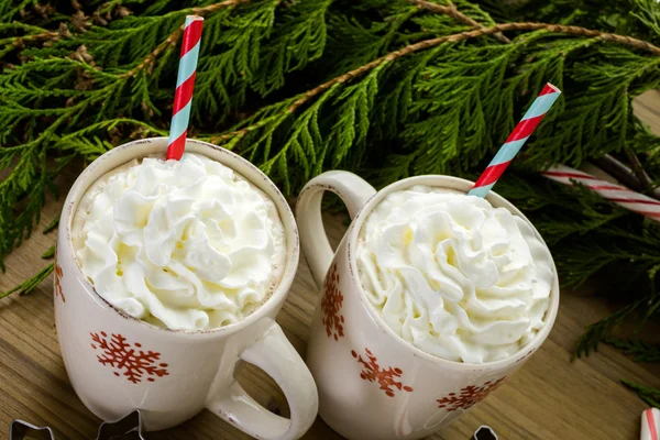 Hot chocolate with whipped cream and straw — Stock Photo, Image