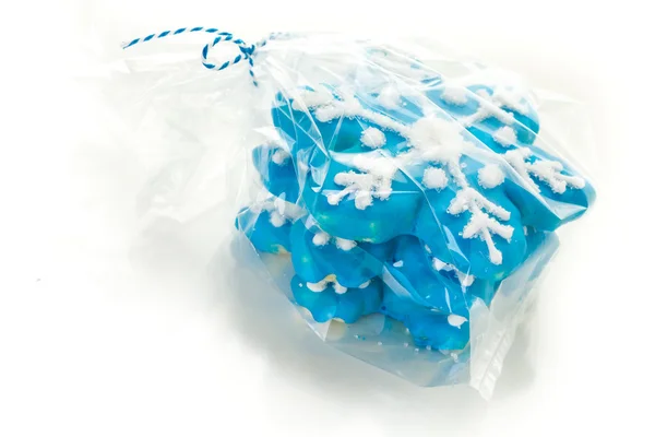 Blue cookies in shape of snowflakes — Stock Photo, Image