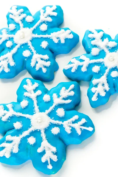 Blue cookies in shape of snowflakes — Stock Photo, Image