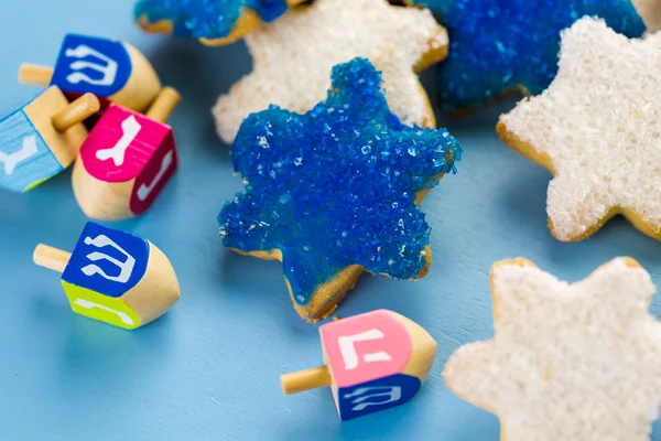 Hanukkah estrellas blancas y azules mano galletas de azúcar esmeriladas —  Fotos de Stock