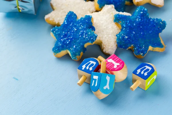Hanukkah estrellas blancas y azules mano galletas de azúcar esmeriladas —  Fotos de Stock