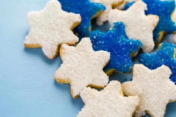 White and blue stars hand frosted sugar cookies — Stock Photo, Image