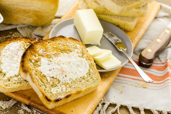 Sourdough bread with butter — Stock Photo, Image