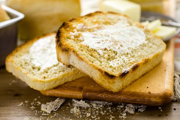 Pão de massa com manteiga — Fotografia de Stock