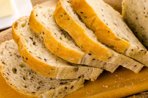 Fresh artisan sourdough seeded bread — Stock Photo, Image