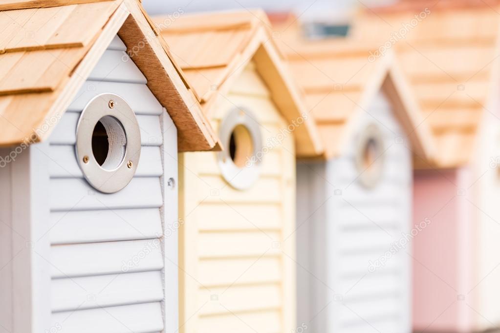 Row of wooden birdhouses