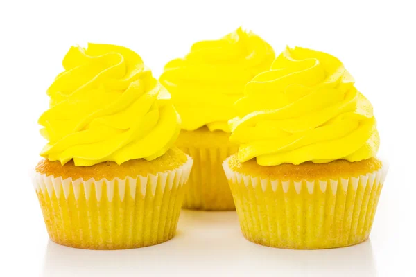 Cupcakes met felle kleur suikerglazuur — Stockfoto