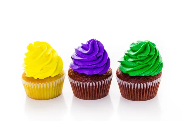 Cupcakes met felle kleur suikerglazuur — Stockfoto