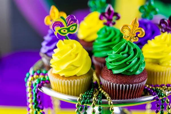 Cupcakes with colorful icing for Mardi Gras — Stock Photo, Image