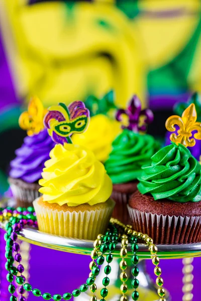 Cupcakes with colorful icing for Mardi Gras — Stock Photo, Image