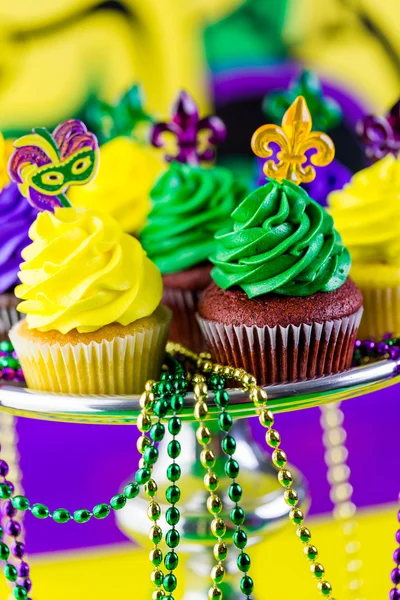 Cupcakes with colorful icing for Mardi Gras — Stock Photo, Image