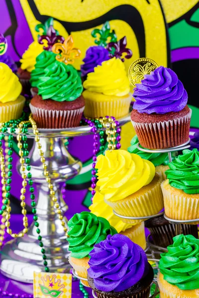 Cupcakes with colorful icing for Mardi Gras — Stock Photo, Image