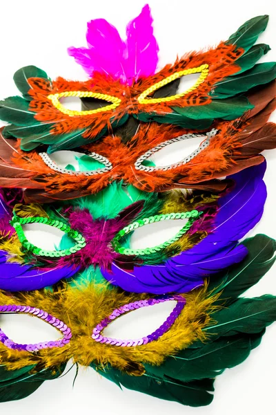 Různobarevné dekorace, pleťové masky na karneval — Stock fotografie