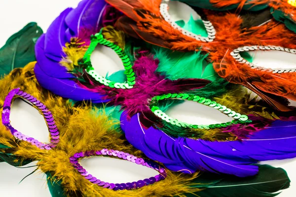 Decorações multicoloridas, máscaras faciais para Mardi Gras — Fotografia de Stock