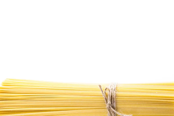 Organic yellow spaghetti pasta — Stock Photo, Image