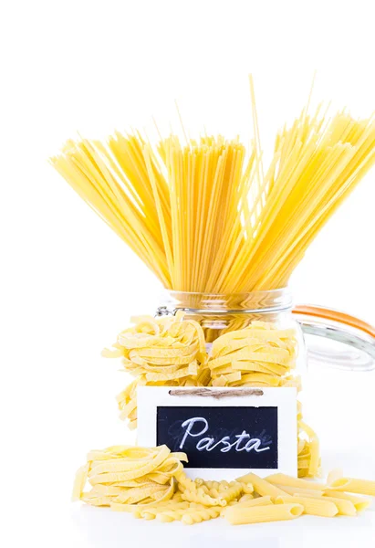 Organic yellow fettuccine nests pasta — Stock Photo, Image