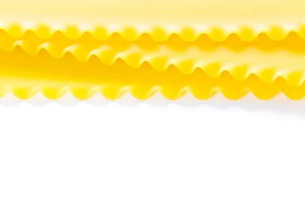 Szerves sárga lasagne tészta — Stock Fotó
