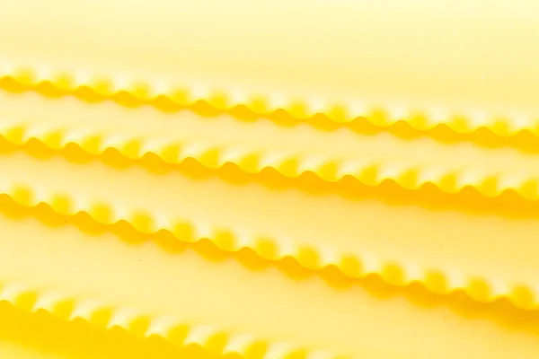 Organic yellow lasagne pasta — Stock Photo, Image