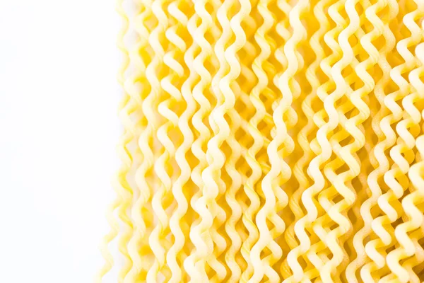 Organische gele lange pasta spiralen — Stockfoto