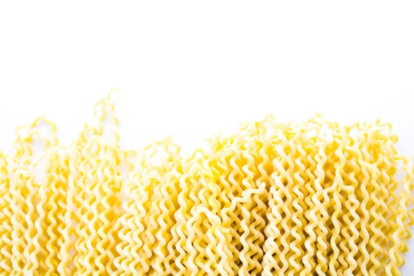 Espiral de massa longa amarela orgânica — Fotografia de Stock