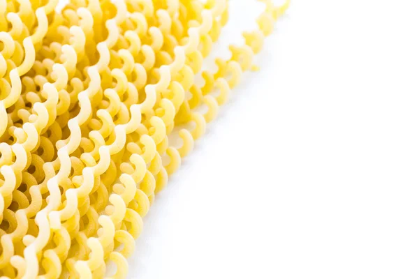 Espiral de massa longa amarela orgânica — Fotografia de Stock