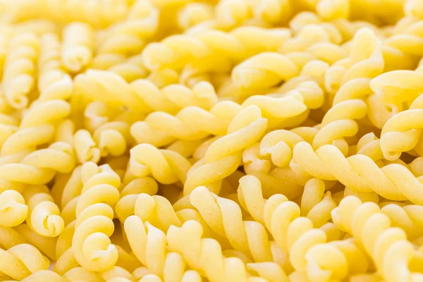 Luomu keltainen gemelli pasta — kuvapankkivalokuva