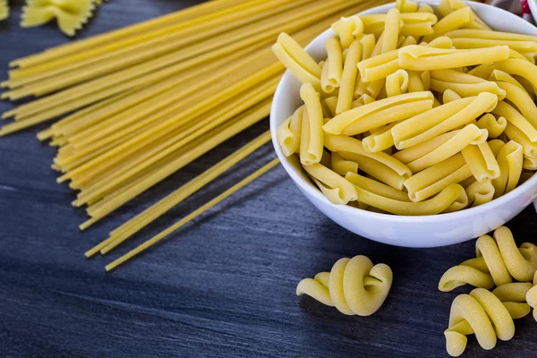 Variety of organic dry pasta — Stock Photo, Image