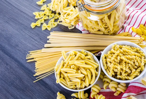 Variety of organic dry pasta — Stock Photo, Image