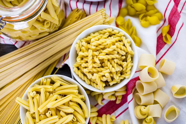 Variety of organic dry pasta — Stock Photo, Image