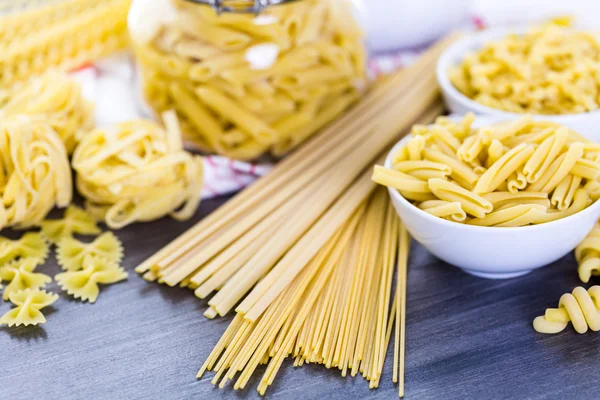 Variety of organic dry pasta — Stock Photo, Image