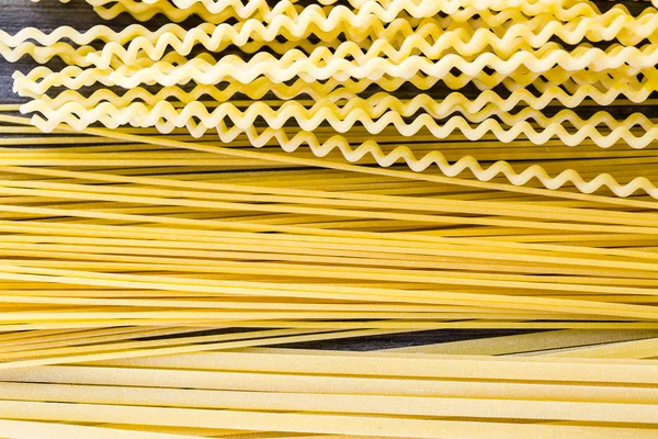 Variety of organic dry pasta — Stock Photo, Image