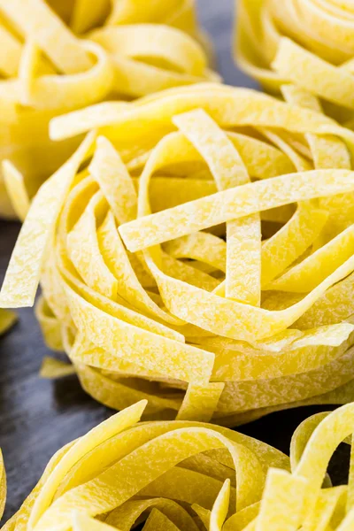 Organic fettuccine nests pasta — Stock Photo, Image