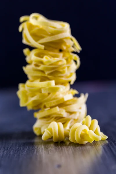 Organic fettuccine nests pasta — Stock Photo, Image