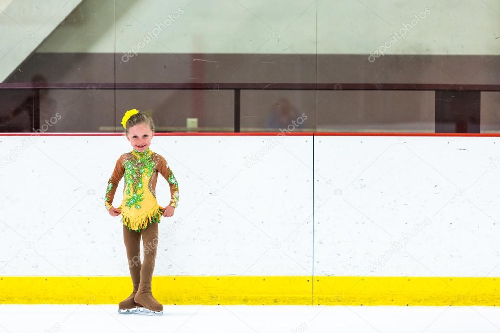 Cute girl practicing ice skating