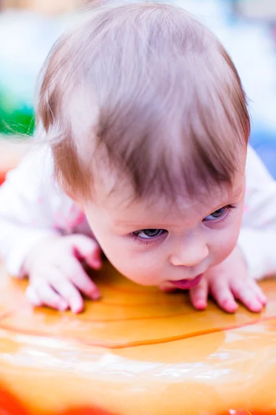 Toddler playing at the playground. — Stock Photo, Image