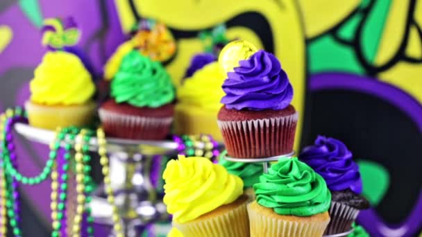 Cupcakes with colorful icing for Mardi Gras — Stock Video