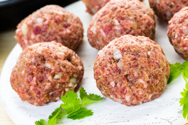 Cooking large homemade Italian meatballs — Stock Photo, Image