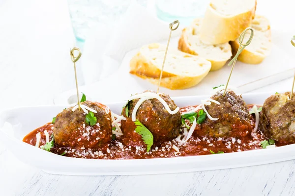 Large Italian meatballs with cilantro and parmesan cheese — Stock Image Large Italian meatballs with cilantro and parmesan cheese Royalty Free Stock Images