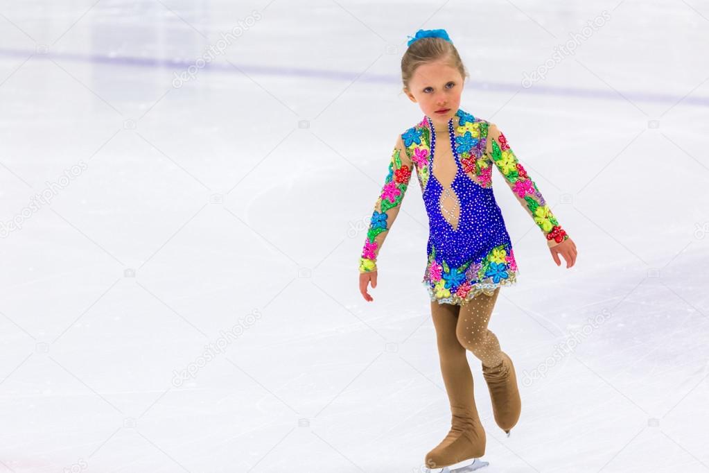Young figure skater practicing