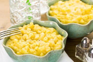 Macaroni and cheese with elbow macaroni. clipart
