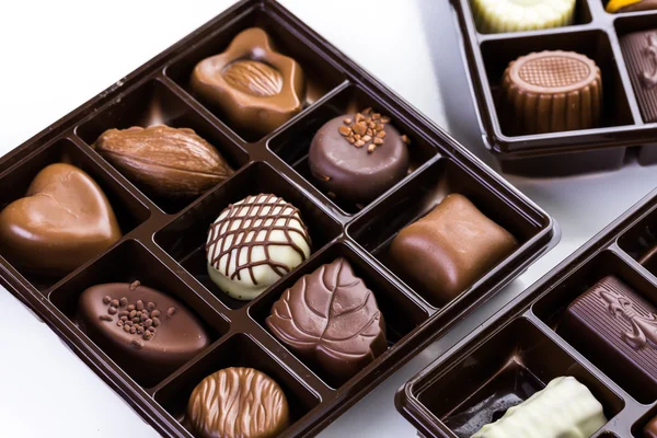 Assorted chocolates in box — Stock Photo, Image