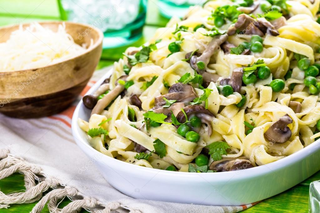 Fettuccine with mushrooms close up