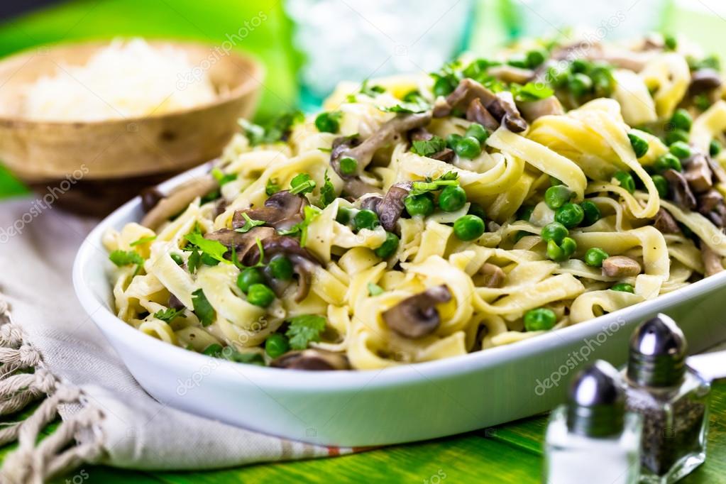 Fettuccine with mushrooms close up
