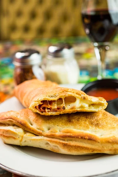 Freshly made Pepperoni calzone — Stock Photo, Image