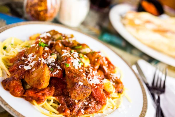 Fresh spaghetti with sausage — Stock Photo, Image