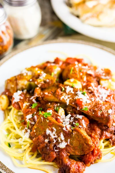 Fresh spaghetti with sausage — Stock Photo, Image